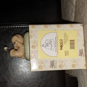 Precious moments porcelain figurine